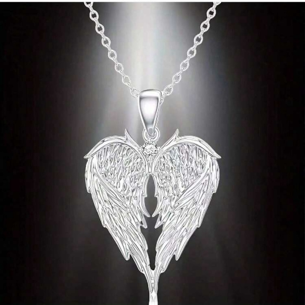 Intricate Silver Heart Wing Necklace